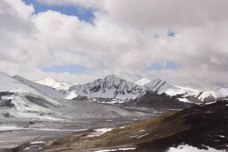 在海拔5013米的米拉山口掛經幡為親人祈福-西藏萬里行之八